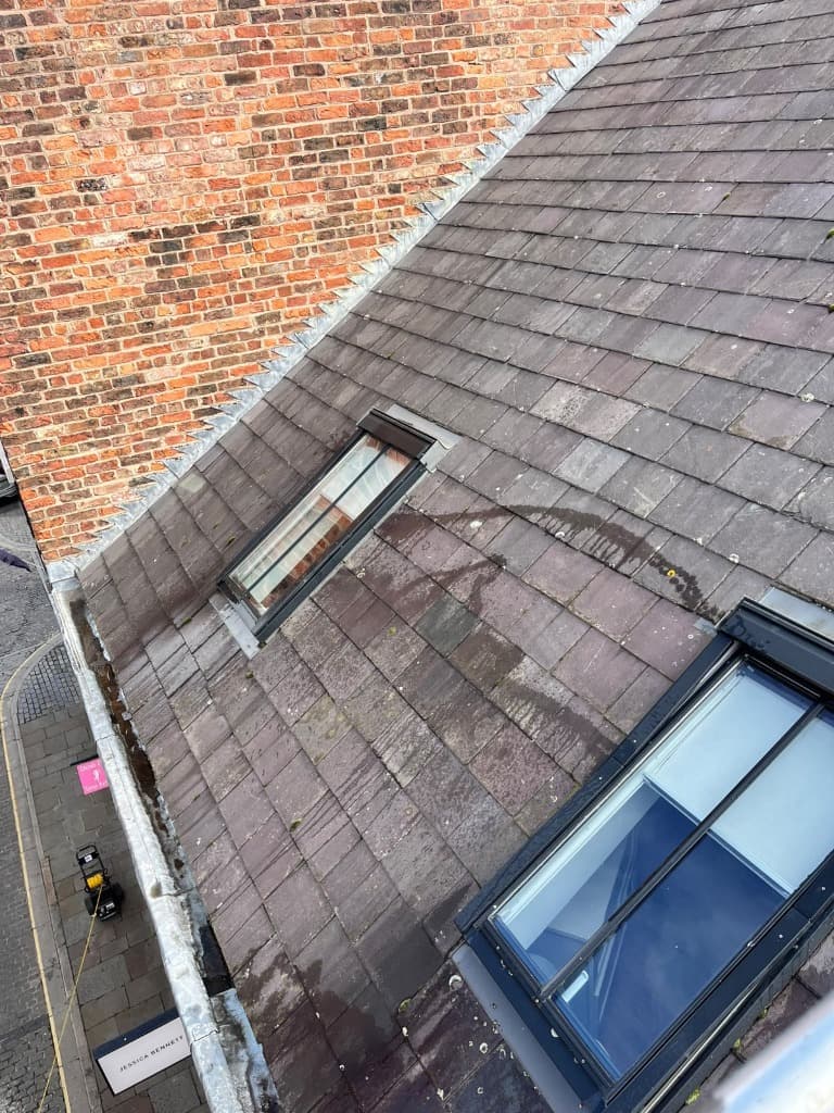 Roof windows on a slate roof viewed from above