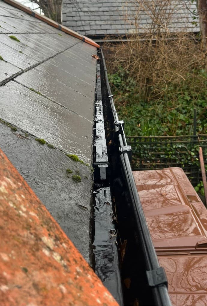 Gutter cleaning with professional equipment